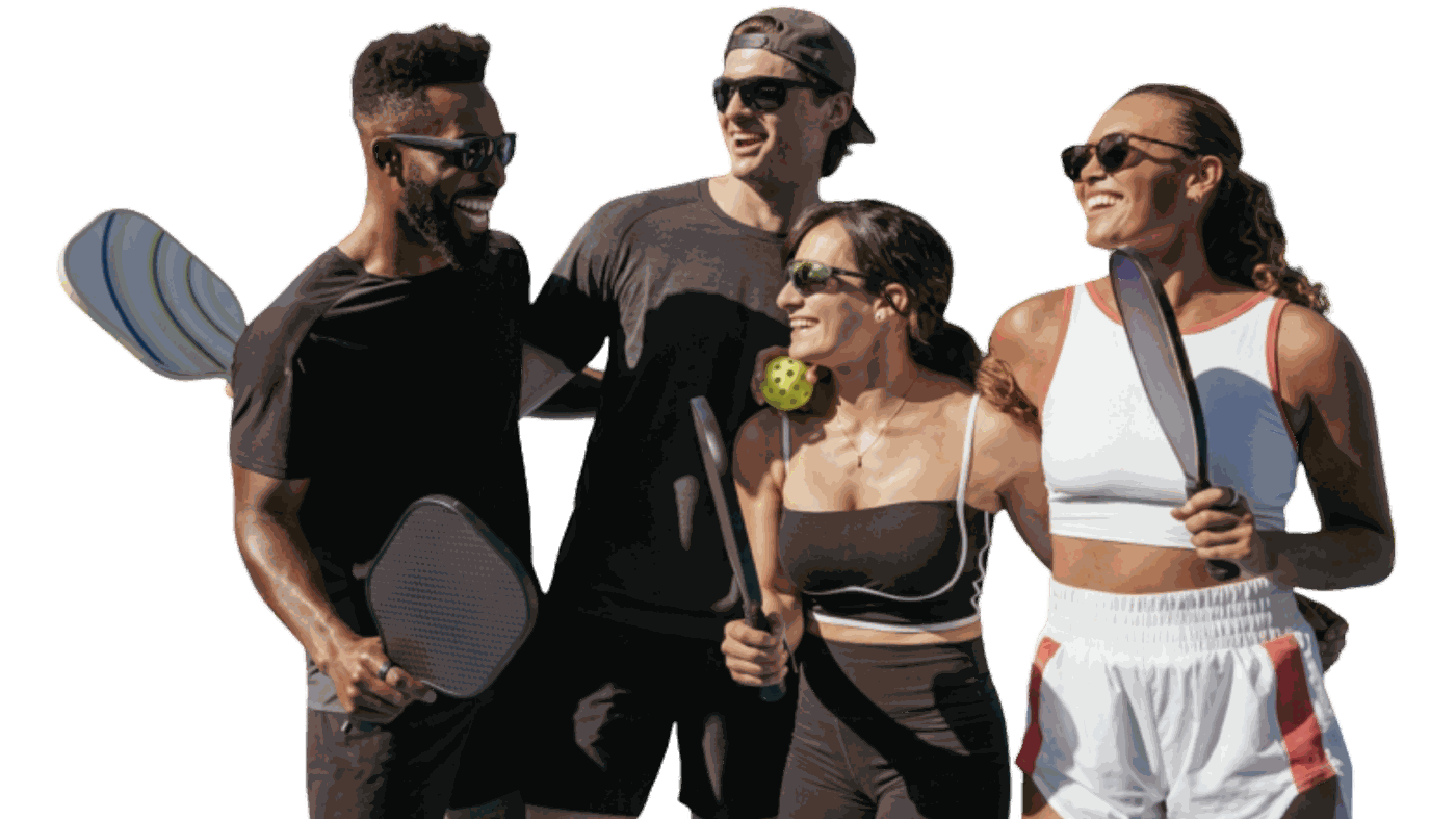 Four TLRC players with pickleball paddles